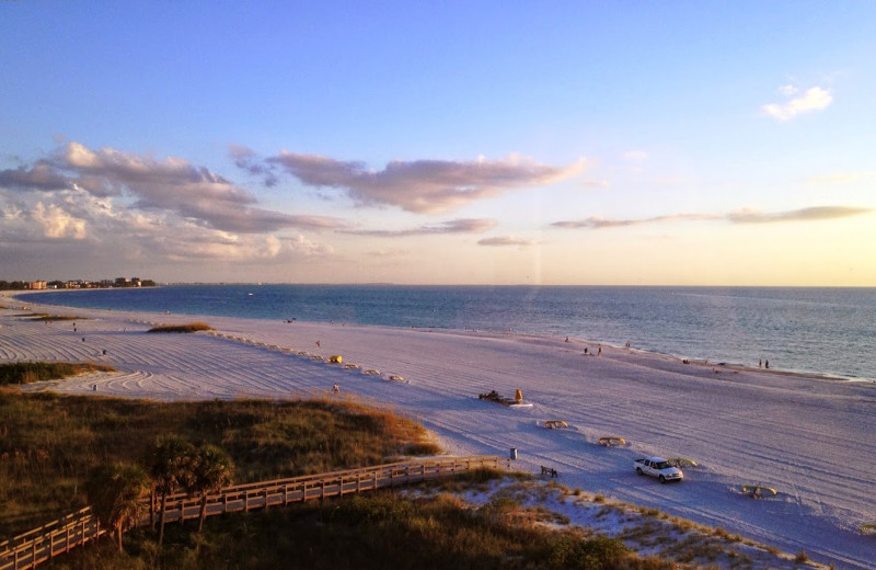 The beach at Sunset Vistas Beachfront Suites.