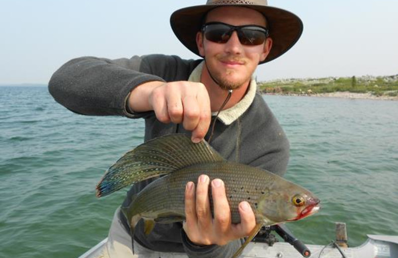 Fishing at Plummer's Arctic Fishing Lodges.