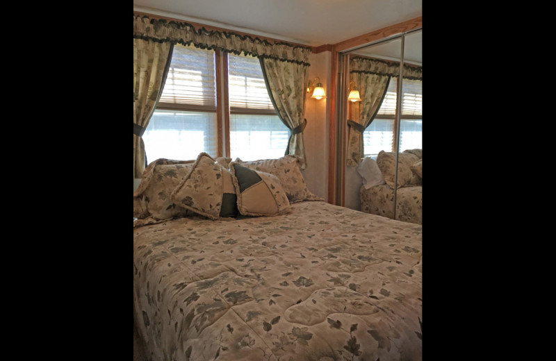 Cabin bedroom at Sullivans Resort & Campground.