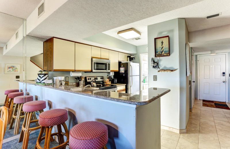 Rental kitchen at Beach Vacation Rentals.