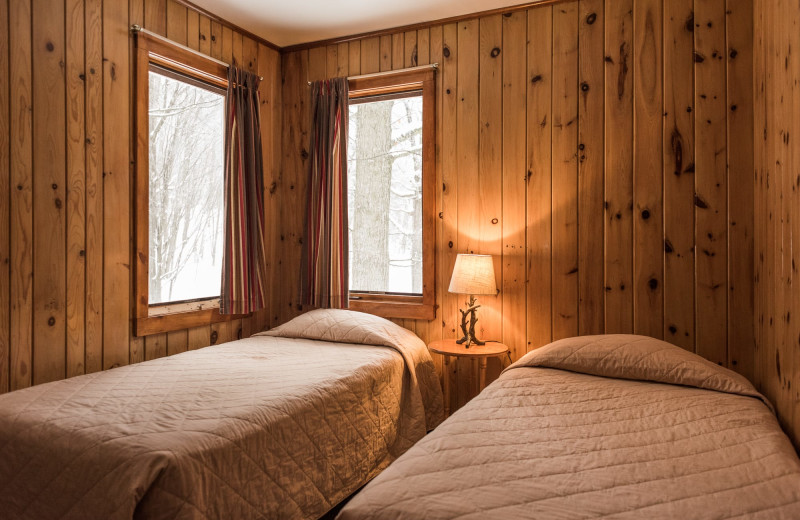 Cabin bedroom at Pitlik's Sand Beach Resort.