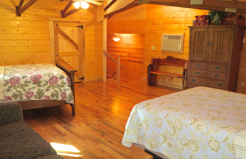 Cabin bedroom at Creeks Crossing Cabins.