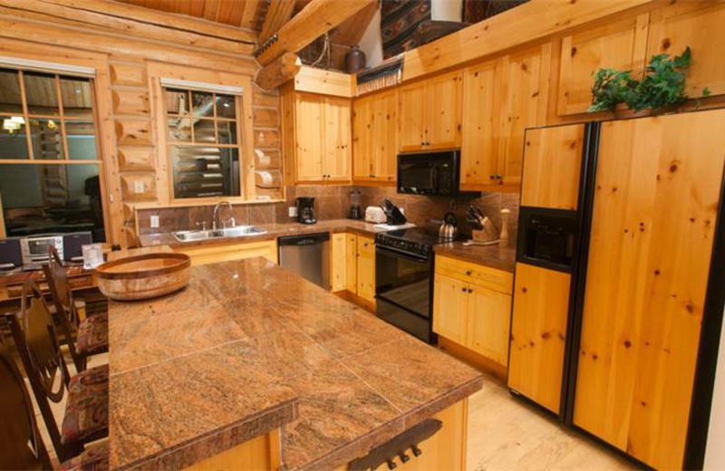 Rental kitchen at Rendezvous Mountain Rentals & Management.