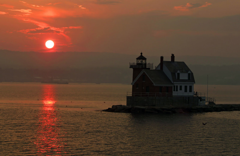 Light house sunset at Mount Battie Motel.