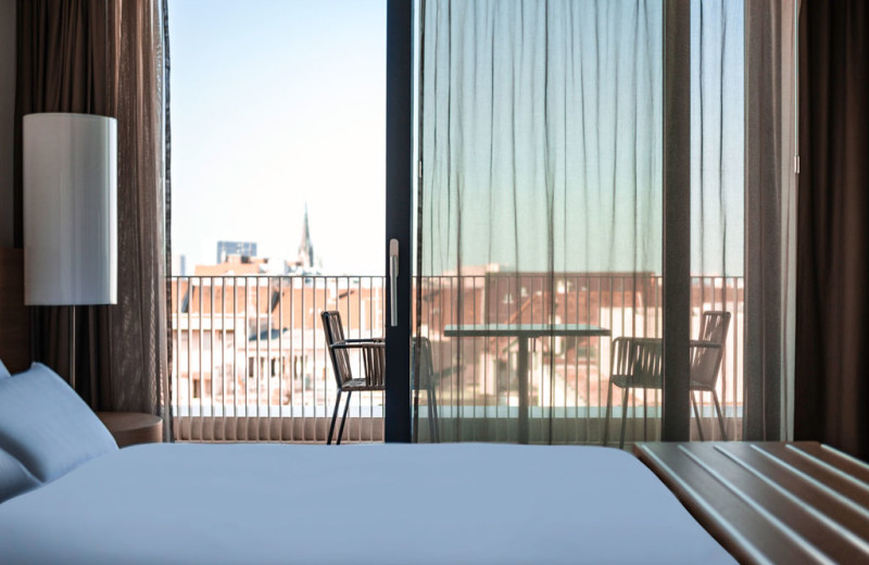 Guest room at Hotel Pullman Basel Europe.