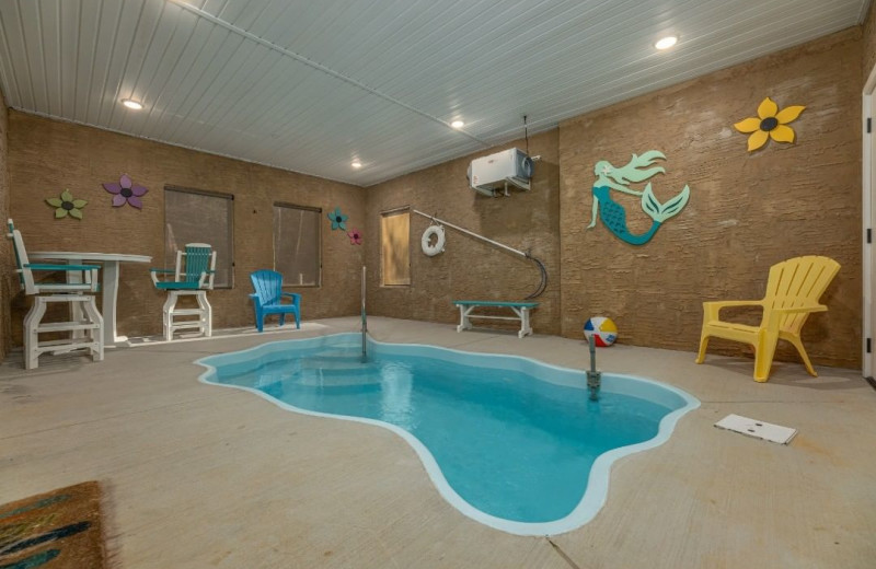 Cabin indoor pool at American Patriot Getaways, LLC.