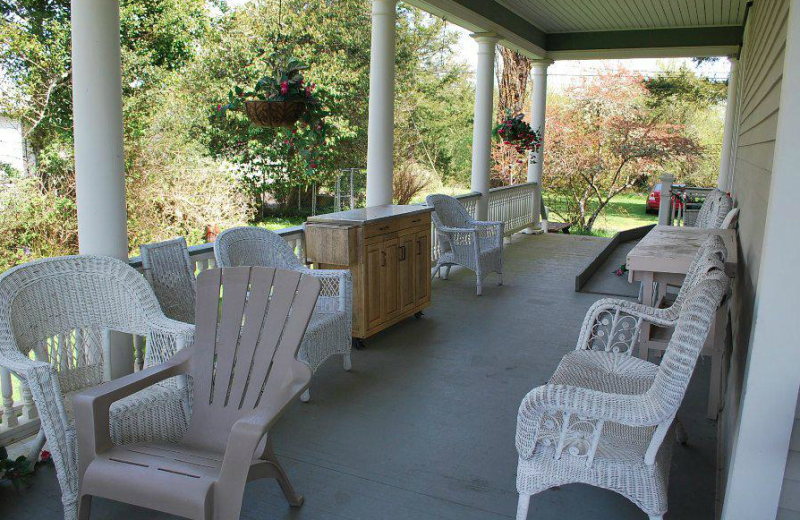 Rental porch at Beachhouse Vacation Rentals.