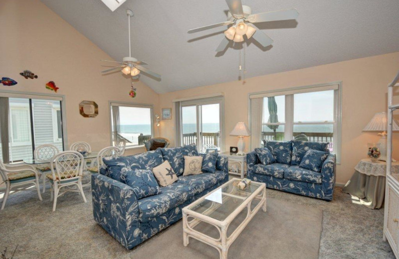 Vacation rental living room at Century 21 Action Inc.