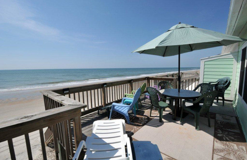 Vacation rental deck at Century 21 Action Inc.