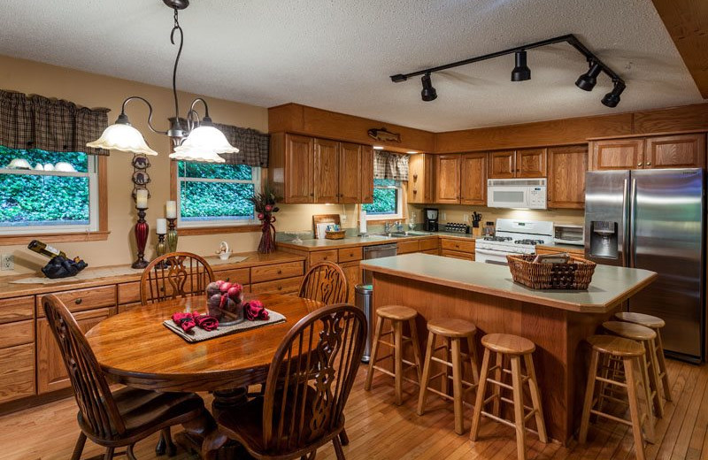Cabin kitchen at Mountain Oasis Cabin Rentals.