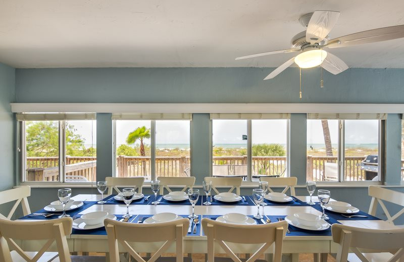 Rental dining room at Sun Palace Vacation Rentals.