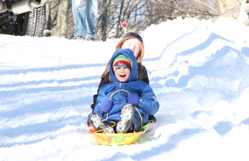 Sledding at Blue Ridge Vacation Cabins. 