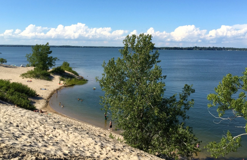 Beach near Sandbanks Summer Village Cottage Resort.