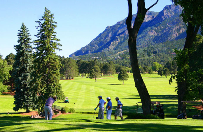 Playing golf at The Broadmoor.