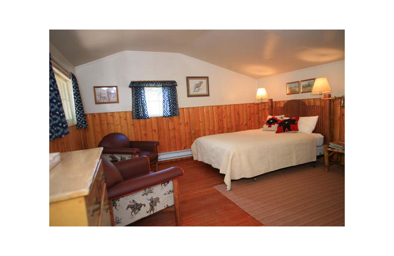 Cabin bedroom at Rimrock Dude Ranch.