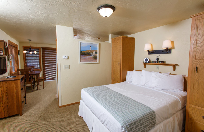 Guest bedroom at Waterbury Inn Condominium Resort.