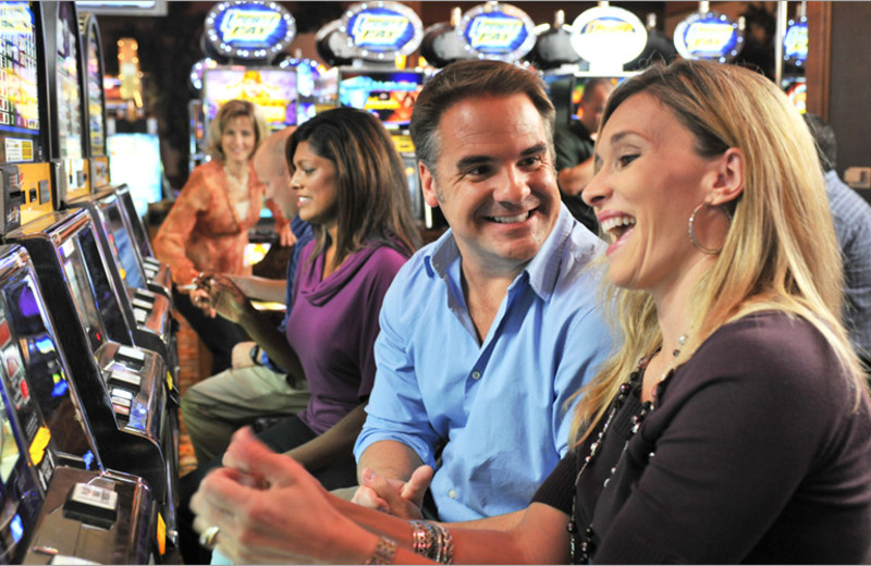 Couple Gambling at Lakeside Hotel Casino