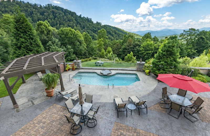 Rental pool with helicopter pad at Yonder Luxury Vacation Rentals.