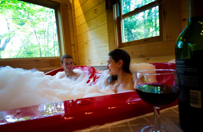 Cabin hot tub at Country Road Cabins.