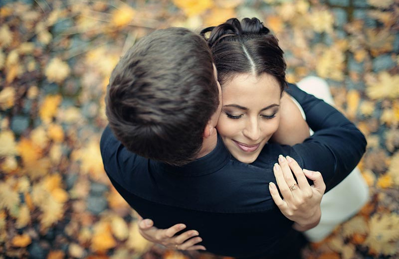 Couple hugging at House Mountain Inn.