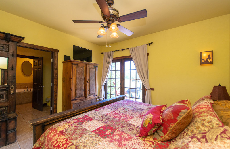 Cabin bedroom at Yogi Bear's Jellystone Park Wichita Falls.