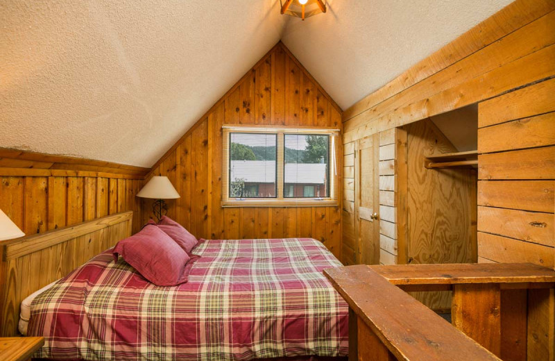 Cabin bedroom at The Glen Eden Resort.