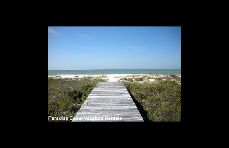 The beach at Paradise Vacation Rentals.