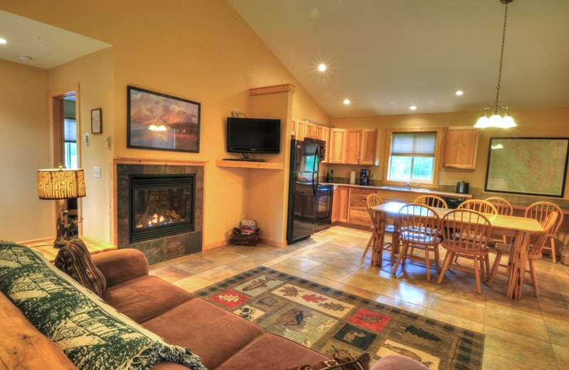 This is the living room and kitchen inside our 3 bedroom deluxe cabin. It's our newest cabin and located only 1/2 mile from Glacier National Park