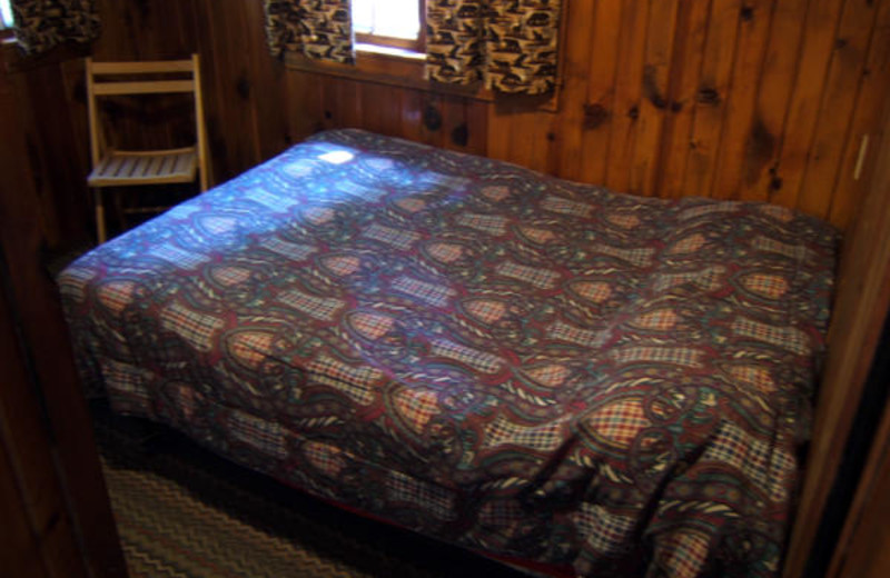 Cabin bedroom at North Shore Lodge & Resort.