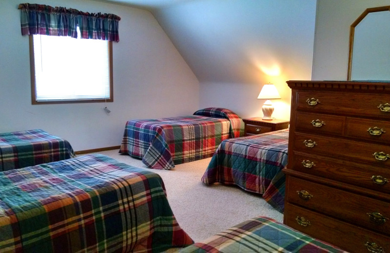 Cabin bedroom at The Arrows.