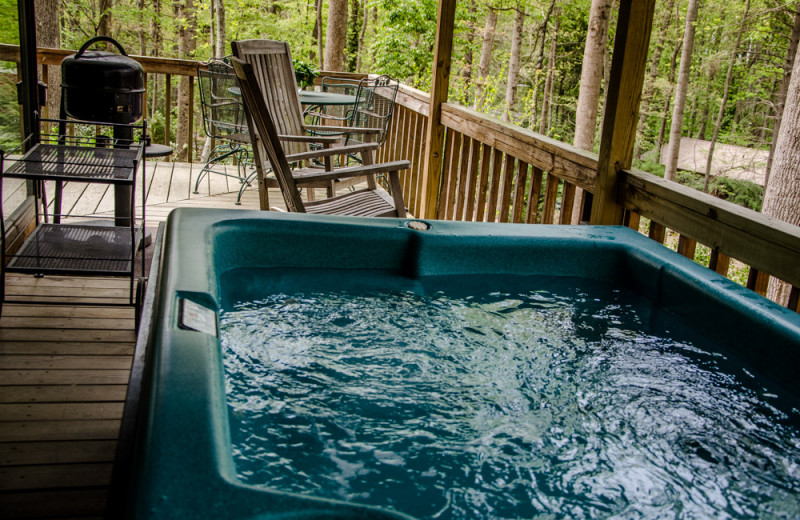 Cabin hot tub at Asheville Cabins of Willow Winds.