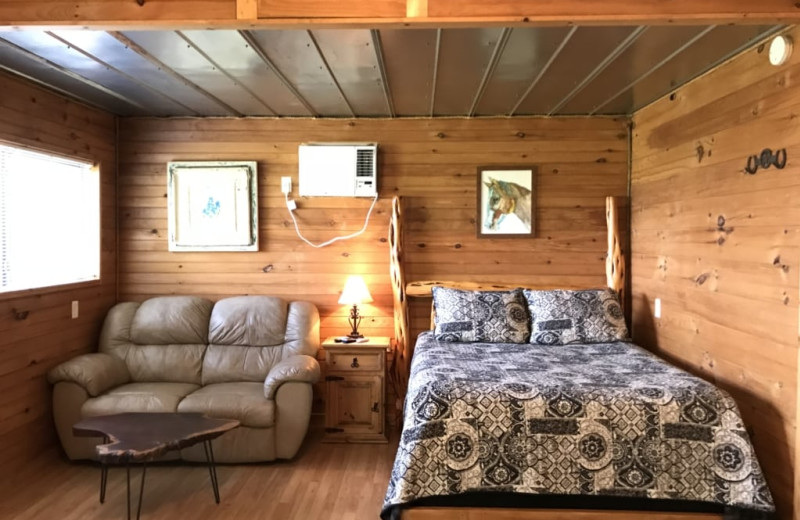 Cabin bed at Walnut Canyon Cabins.