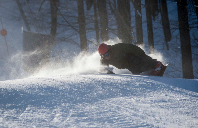 Snowboarding at Holiday Valley Resort.