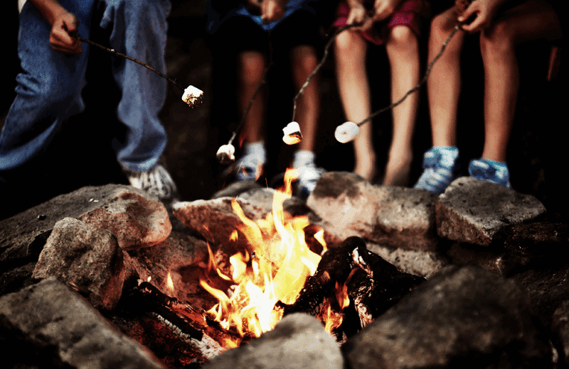 Roasting marshmallows at Nitschke's Northern Resort.