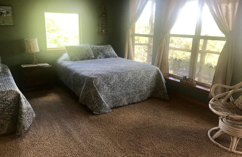 Cabin bedroom at Creekside Camp & Cabins.