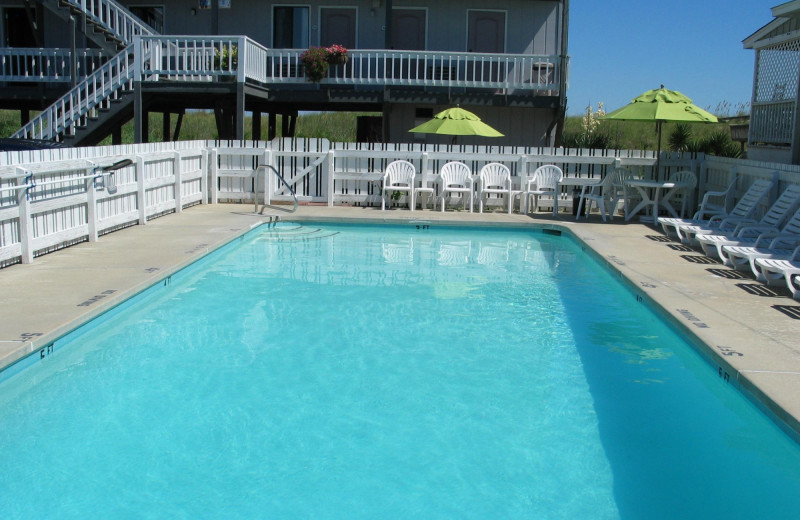 Outdoor pool at Beach House Inn and Suites.