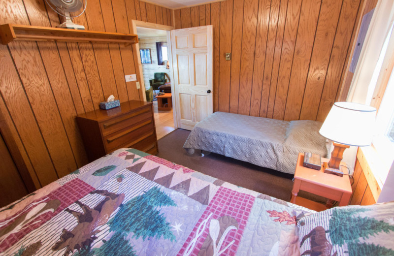 Cabin bedroom at Krueger's Harmony Beach Resort.