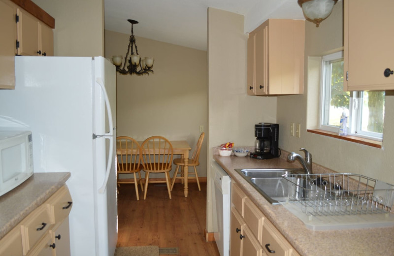 Cabin kitchen at Mulberry Mountain Lodging & Events.