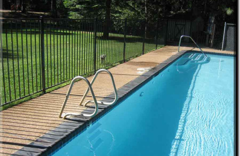 Outdoor pool at Harmony Ridge Resort.