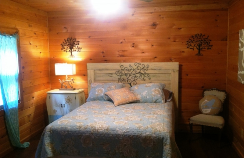 Cabin bedroom at Cabins in Hocking.