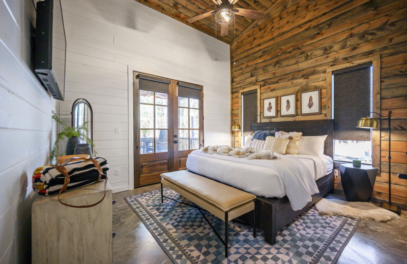 Rental bedroom at Blue Beaver Luxury Cabins.