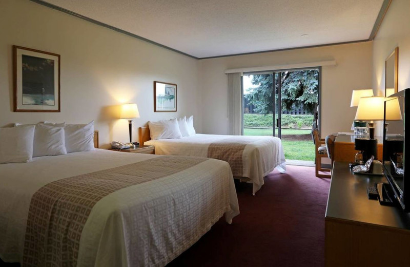 Guest room at Village Green Hotel & Casino.