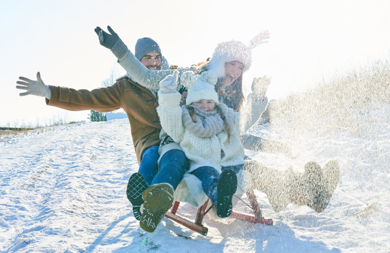 Family sledding at Surfside on Lake Superior.