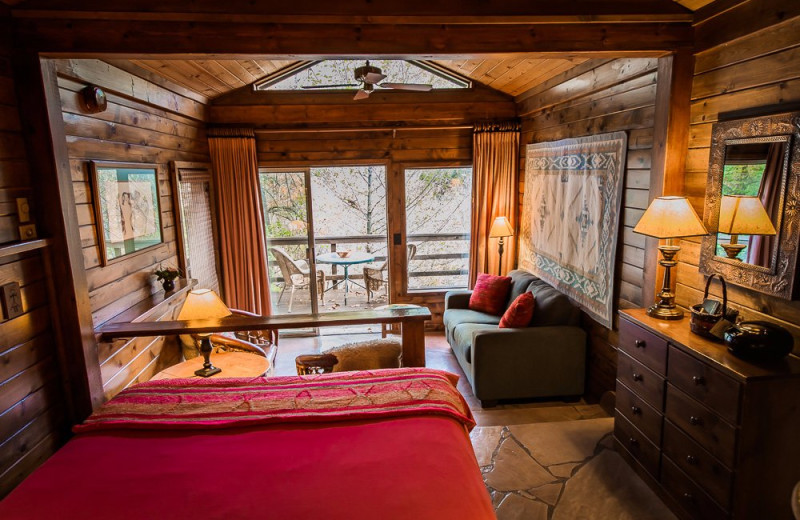 Cabin bedroom at Briar Patch Inn.