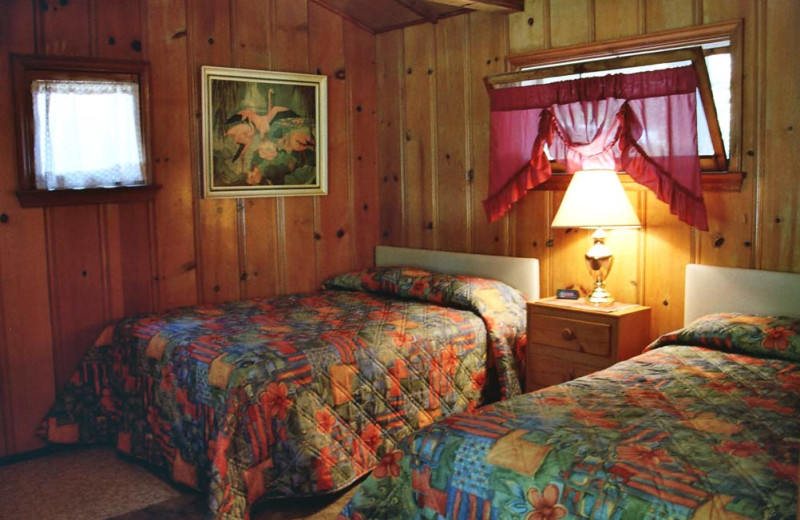 Cabin bedroom at Country Hills Resort.