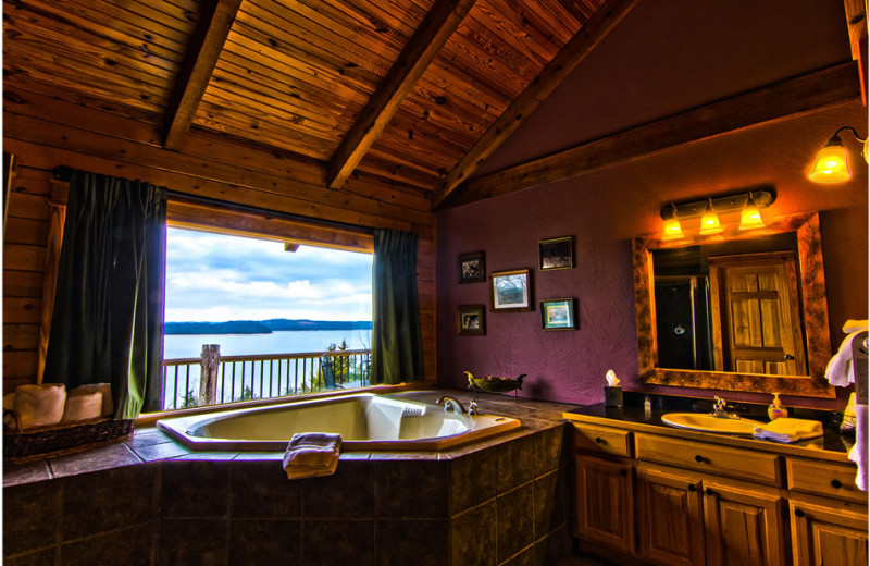 Cabin hot tub at Whispering Hills Cabins.