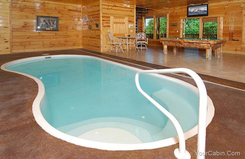 Cabin indoor pool at Timber Tops Luxury Cabin Rentals.