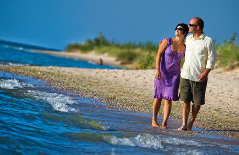 Couple on beach at The Homestead.