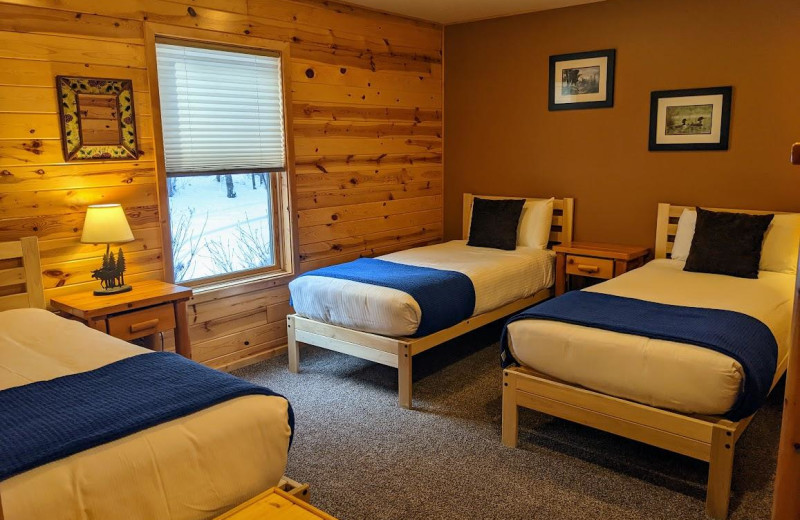 Cabin bedroom at Pehrson Lodge Resort.