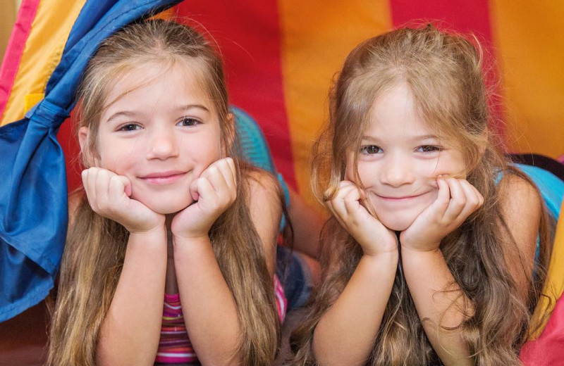Kids in tent at Great Blue Resorts- McCreary's Beach Resort.
